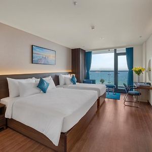 Grand Dreibettzimmer mit Strandblick